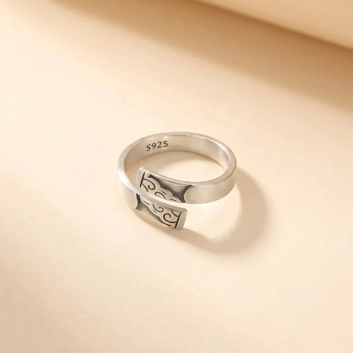 Cloud Nine open wrap S925 sterling silver ring with engraved motif by Maadin Artistry