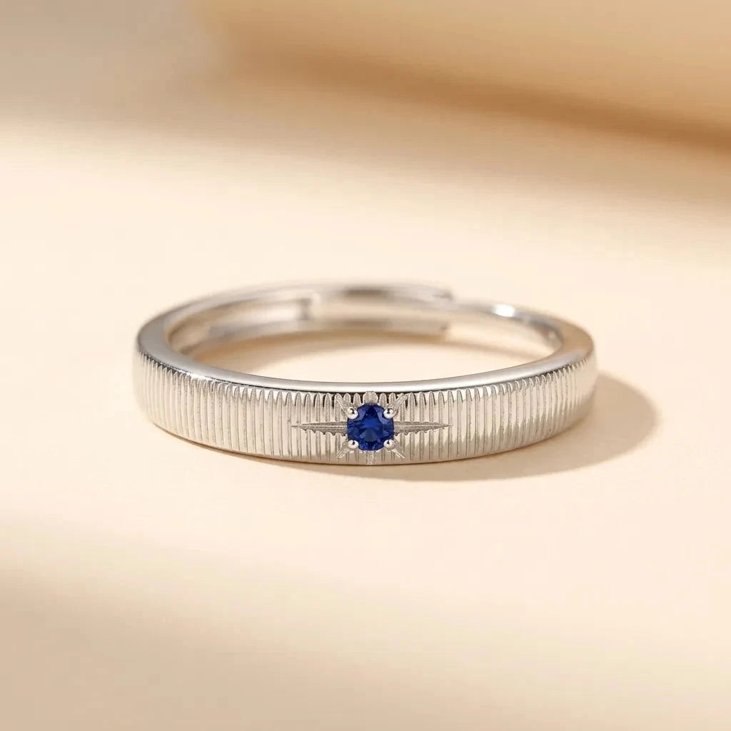 Blue Star ribbed S925 sterling silver band ring with a blue star-set stone by Maadin Artistry