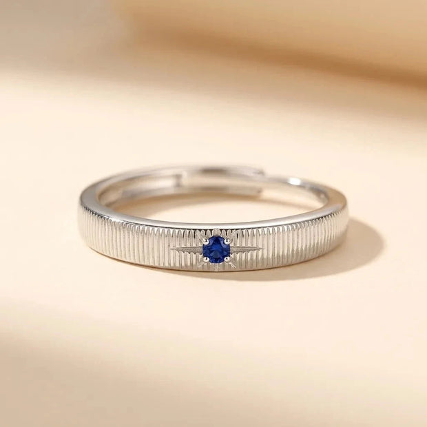 Blue Star ribbed S925 sterling silver band ring with a blue star-set stone by Maadin Artistry