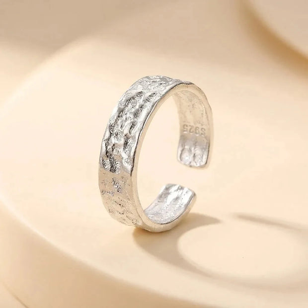 Molten hammered-texture open adjustable S925 sterling silver band ring by Maadin Artistry