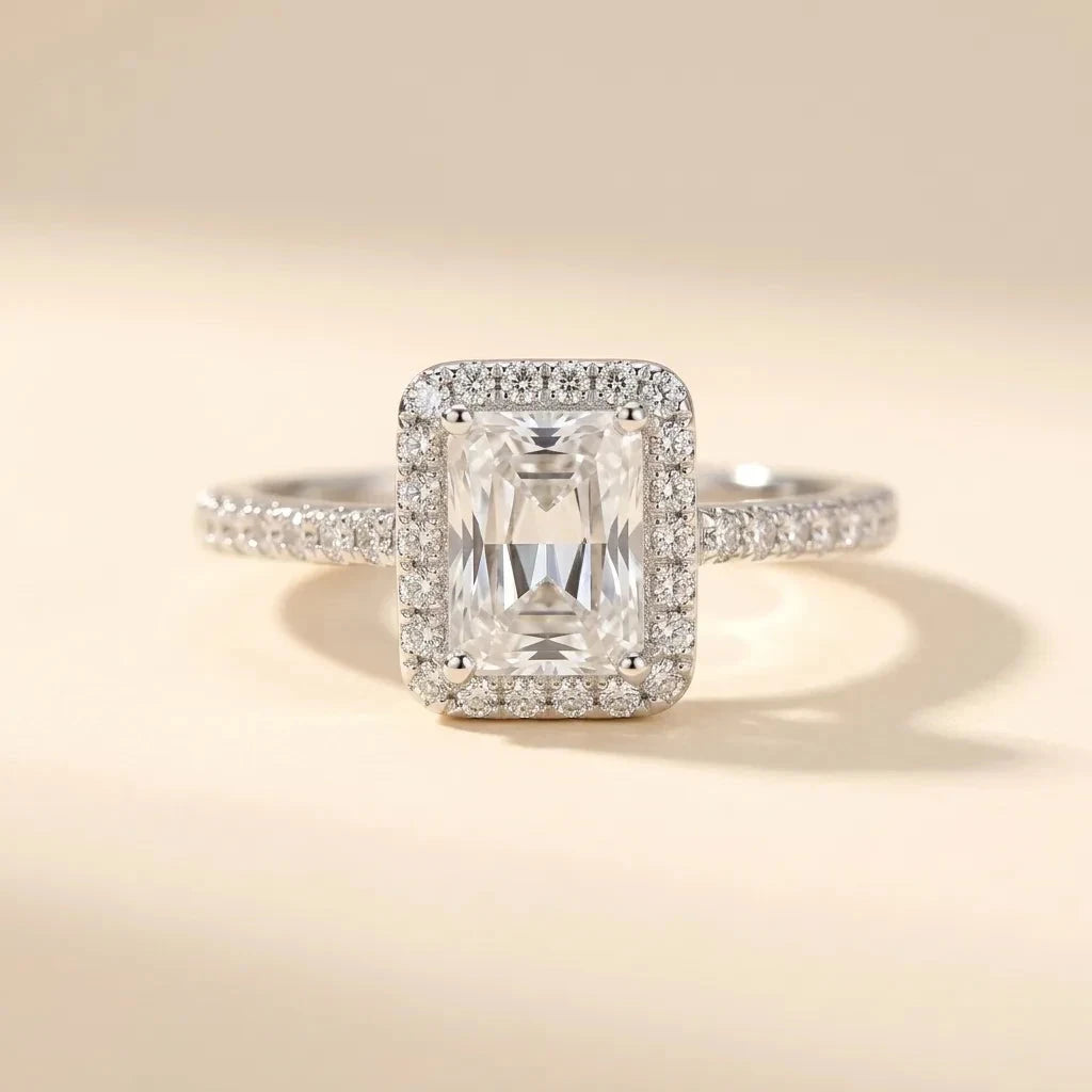 Oblong emerald-cut halo ring with pavé diamond-style band in S925 sterling silver by Maadin Artistry