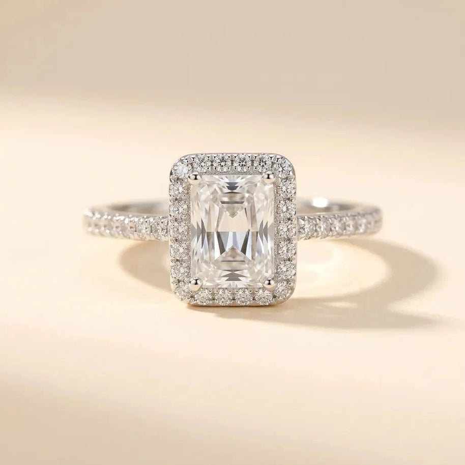 Oblong emerald-cut halo ring with pavé diamond-style band in S925 sterling silver by Maadin Artistry