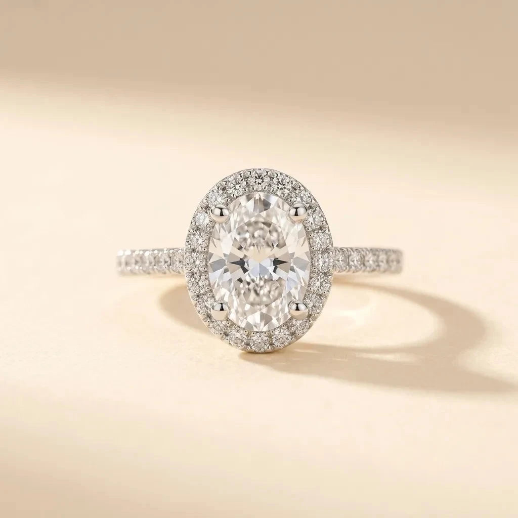 Ovate oval-cut halo ring with pavé band in S925 sterling silver by Maadin Artistry