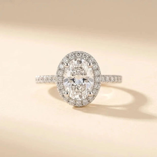 Ovate oval-cut halo ring with pavé band in S925 sterling silver by Maadin Artistry