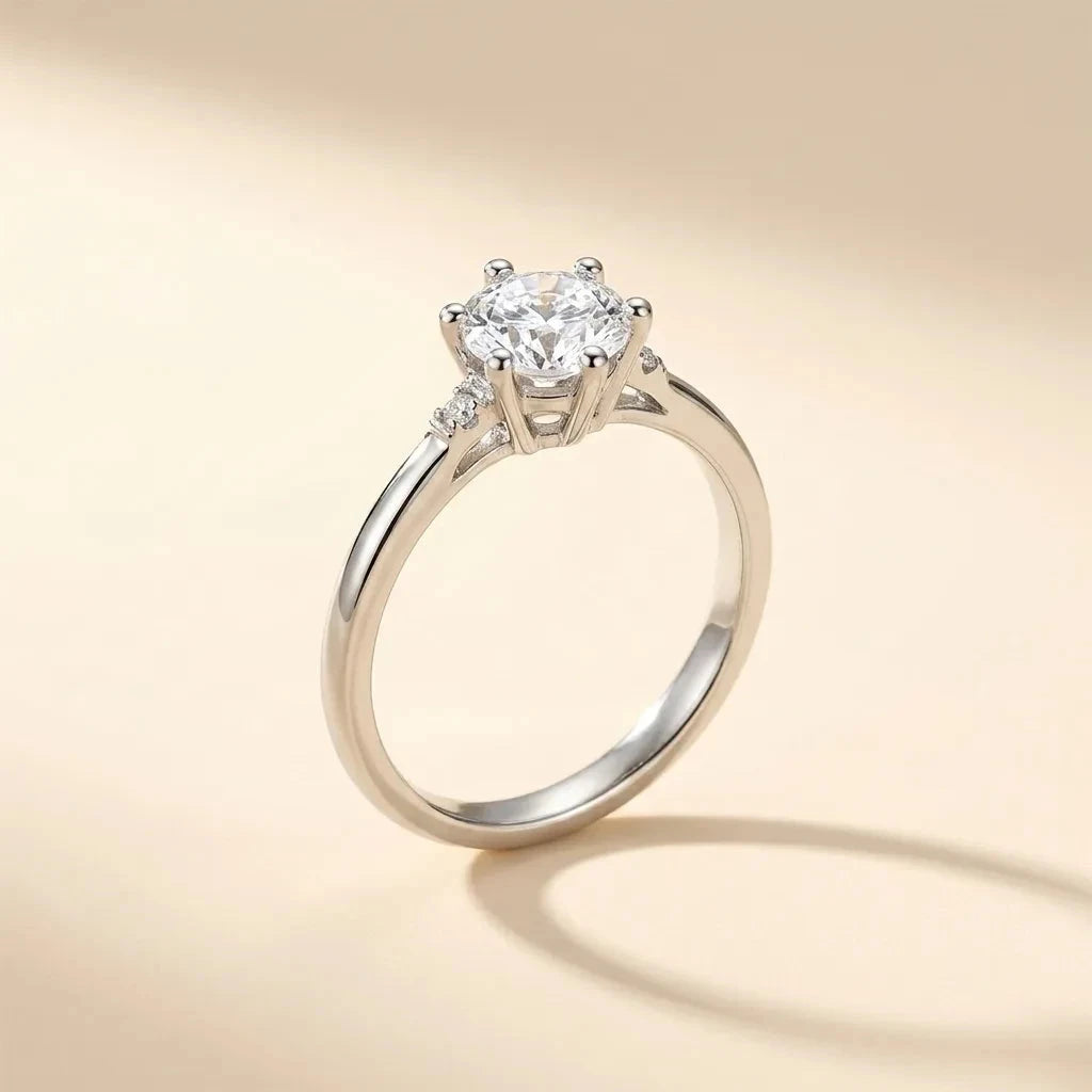 Solitaire Baby six-prong solitaire ring with side stones in S925 sterling silver by Maadin Artistry