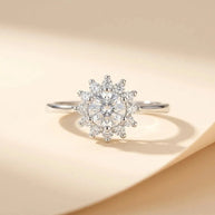 Sunshine sunburst halo ring with a round center stone in S925 sterling silver by Maadin Artistry
